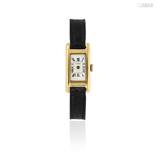 Cartier. A lady's 18K gold manual wind rectangular