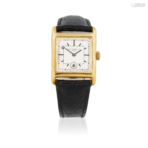 Patek Philippe. An 18K gold manual wind rectangular