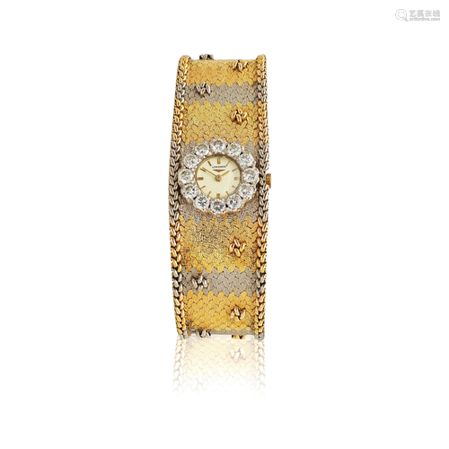 Longines. A lady's 18K gold and diamond set manual wind