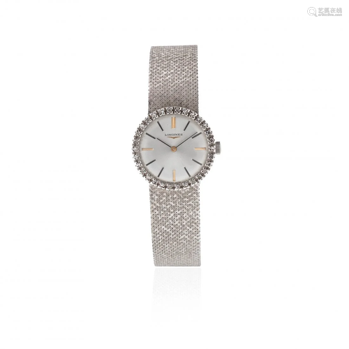 Longines. A lady's 18K white gold and diamond set