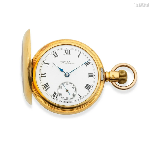 Waltham. An 18K gold keyless wind half hunter pocket