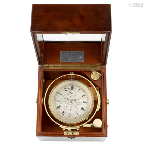 Thos Cogdon. A brass cased marine chronometer gimbal