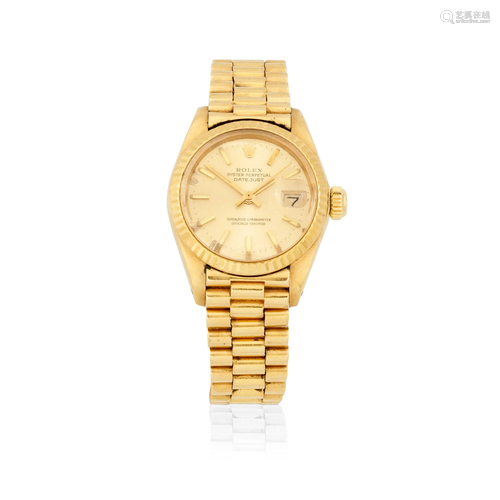 Rolex. A lady's 18K gold automatic calendar bracelet