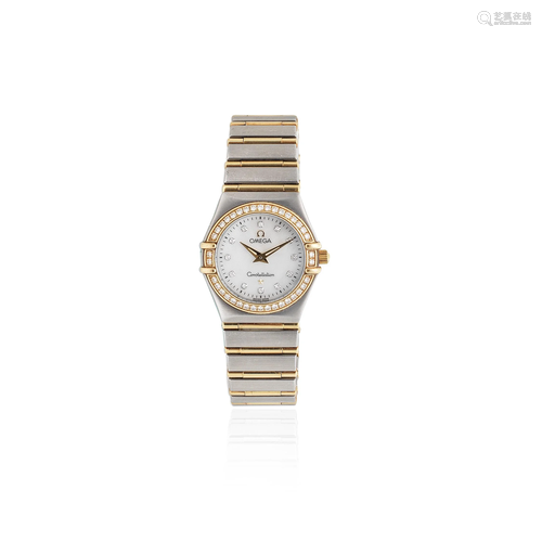 Omega. A lady's stainless steel, gold and diamond set