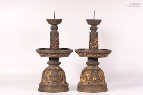 A pair of bronze gilded dragon pattern Candlesticks