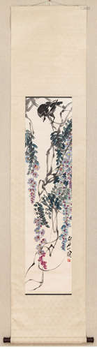 A Chinese Ink Painting by Qi Baishi: Myna admist Wisteria Br...