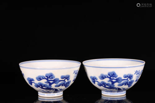 A pair of blue and white pine, bamboo and plum bowls