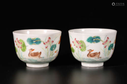 A pair of mandarin duck cups in the lotus pond