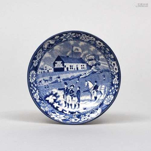 1815 WATERLOO Une soucoupe en porcelaine bleue et blanche, v...