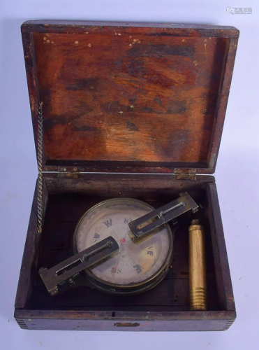 AN ANTIQUE F ROBSON AND CO COMPASS. 13 cm diameter.