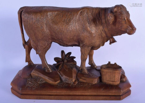 A 19TH CENTURY BAVARIAN BLACK FOREST OF A STANDING COW
