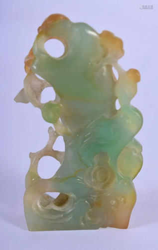 AN EARLY 20TH CENTURY CHINESE CARVED JADE FIGURE OF A