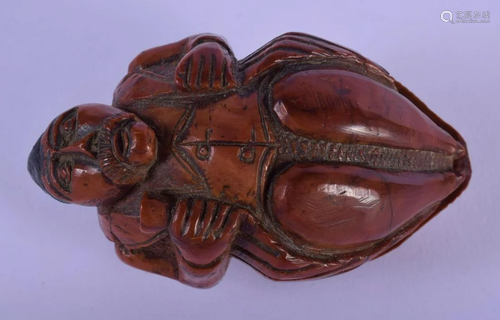 AN 18TH CENTURY FRENCH CARVED COQUILLA NUT SNUFF BOX