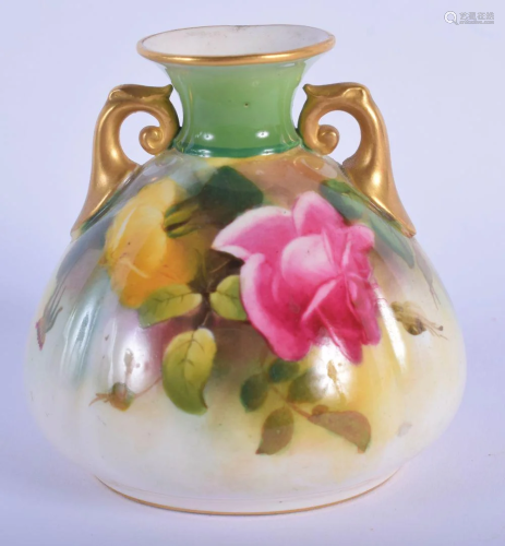 Royal Worcester two handled vase painted with roses,