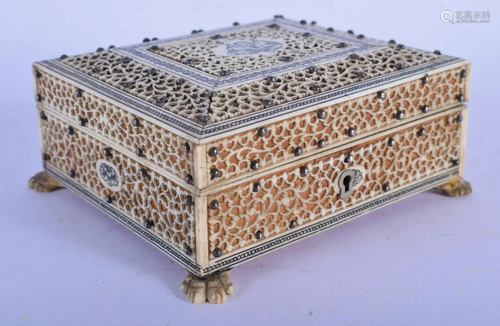 A 19TH CENTURY ANGLO INDIAN CARVED IVORY AND SAND…