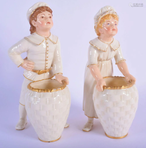 Royal Worcester figures of a boy and girl holding a