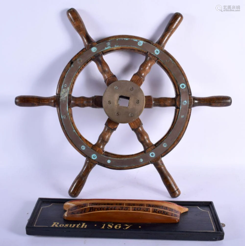AN EARLY 20TH CENTURY MARITIME SHIPS WHEEL together