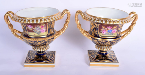 A PAIR OF EARLY 19TH CENTURY EUROPEAN TWIN HANDLED