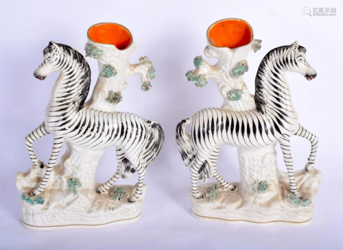 A LARGE PAIR OF ANTIQUE STAFFORDSHIRE ZEBRA SPILL