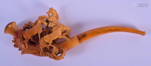 A 19TH CENTURY EUROPEAN CARVED AMBER AND MEERSCHAUM