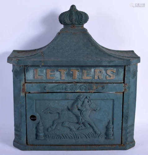 AN ANTIQUE GREEN PAINTED CAST IRON LETTER BOX decorated