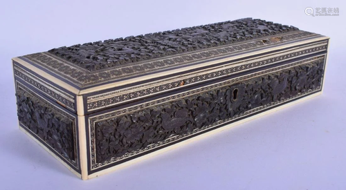 A 19TH CENTURY ANGLO INDIAN CARVED HARDWOOD CASKET