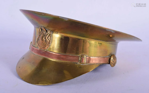 A 19TH CENTURY BRASS AND COPPER TRENCH ART MILITARY