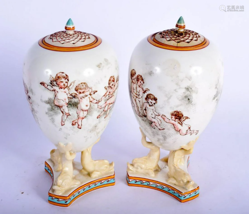 A PAIR OF 19TH CENTURY WEDGWOOD VASES AND COVERS