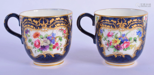Royal Worcester pair of coffee cups painted with flower