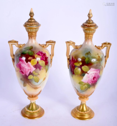 A PAIR OF ANTIQUE ROYAL WORCESTER VASES AND COVERS