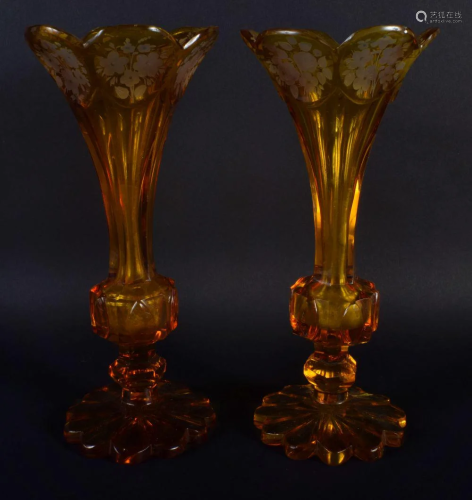 A PAIR OF 19TH CENTURY BOHEMIAN AMBER GLASS VASES. 21