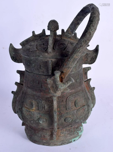 A LARGE CHINESE ARCHAIC BRONZE VASE AND COVER probably