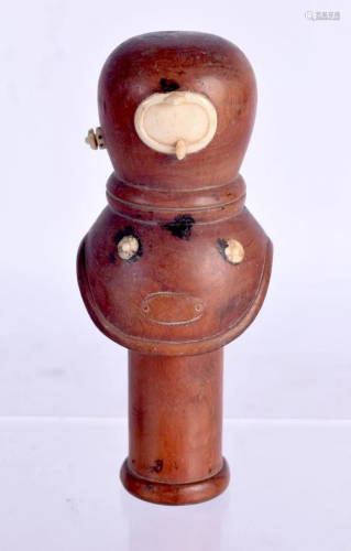 A JAPANESE BOXWOOD AND BONE DIVERS HELMET CANE HANDLE.