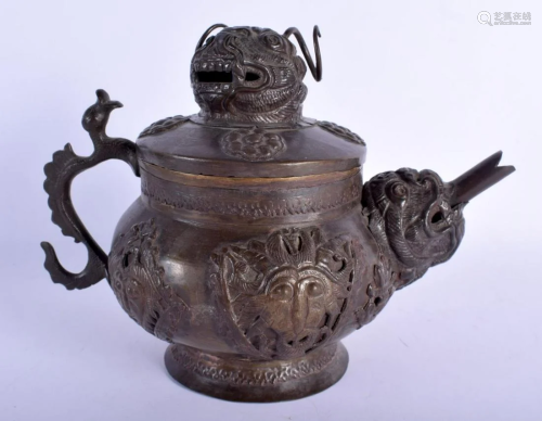 A 19TH CENTURY TIBETAN TEAPOT AND COVER decorated with