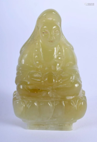 AN EARLY 20TH CENTURY CHINESE JADE FIGURE OF A