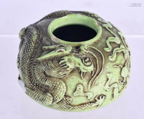 A 19TH CENTURY CHINESE GREEN GLAZED PORCELAIN BRUSH