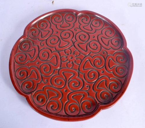 A CHINESE QING DYNASTY CARVED RED LACQUER TIXI DISH