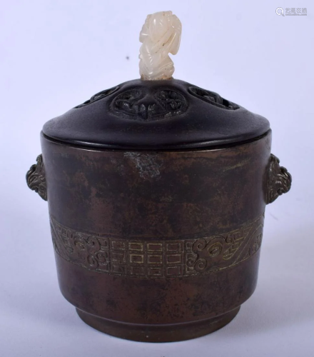 A CHINESE QING DYNASTY TWIN HANDLED BRONZE CENSER