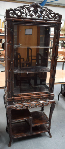 A Hongmu faux bamboo display cabinet on stand, 19th