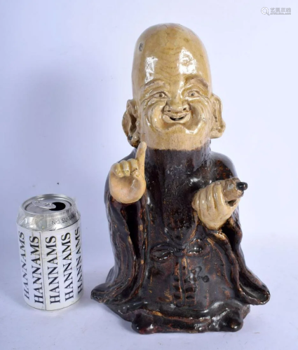 A LARGE EARLY 20TH CENTURY CHINESE BROWN GLAZED…