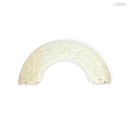 A Carved White Jade Huang