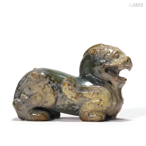 A Carved Jade Figure Of Beast