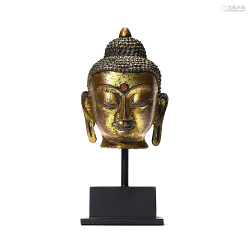 A Gilt Bronze Figure Of Buddha Head