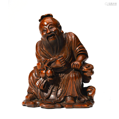 A Carved Bamboo Figure Of Immortal