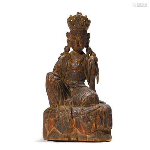 A Carved Wood Figure Of Avalokitesvara