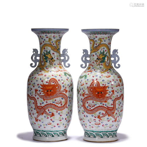 A Pair Of Wucai Dragon And Wave Vases