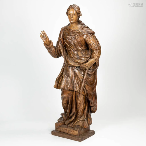 A large wood sculptured figurine. 17th-18th century.