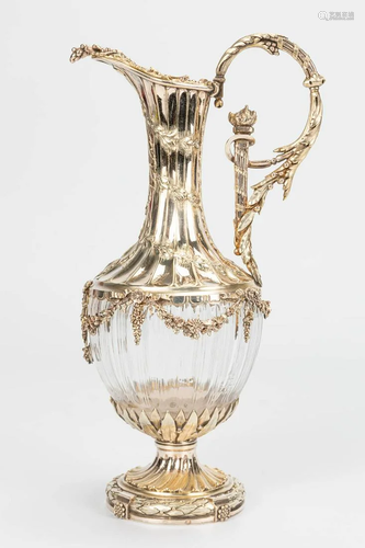 An exceptional pitcher made of crystal mounted with