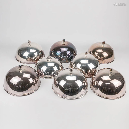 A collection of 8 silver-plated plate serving cloches