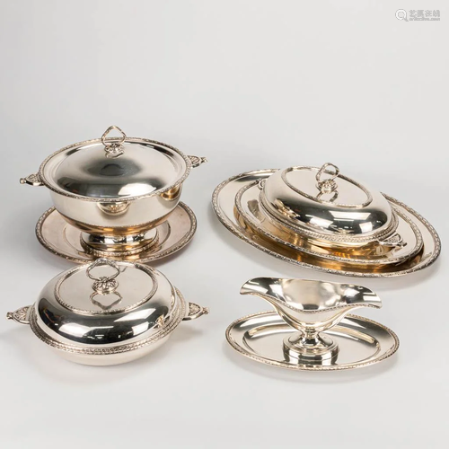 A collection of silver-plated serving items